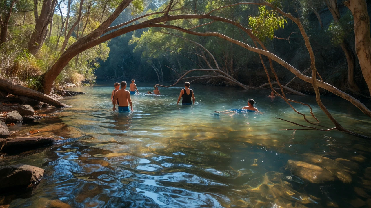 Swimmers wading in the natural, unpatrolled pools of Pirramimma Creek surrounded by forest.